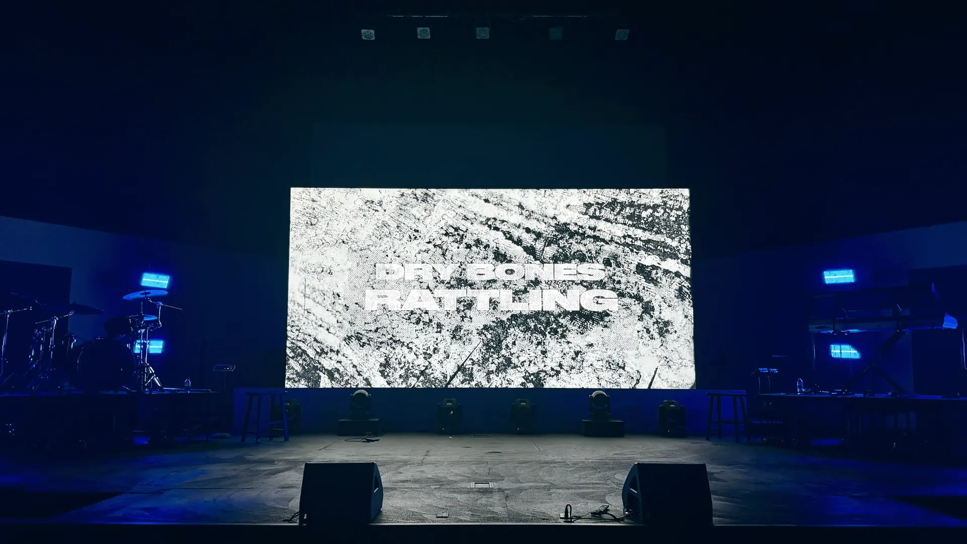 Expansive LED screen with vivid visuals on a church performance stage